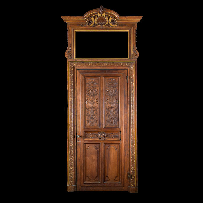 A grand pair of French walnut doors