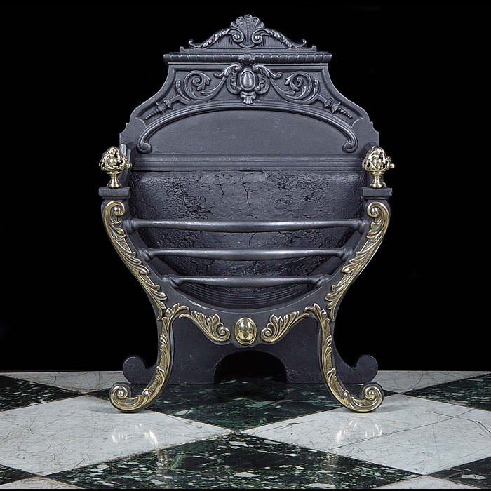 A Rococo Style Cast Iron & Brass Fire Grate