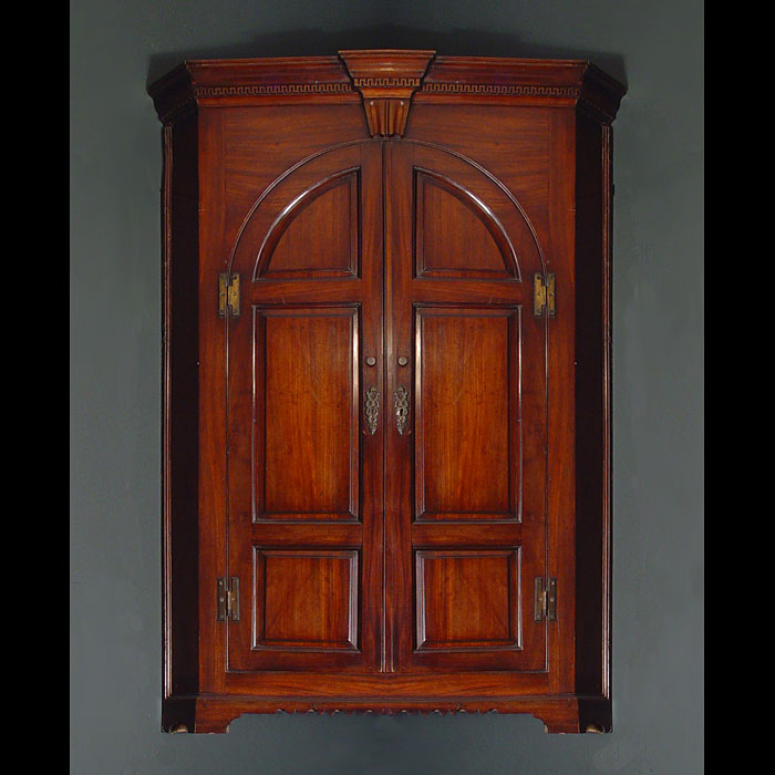 A George III Mahogany Corner Cupboard



