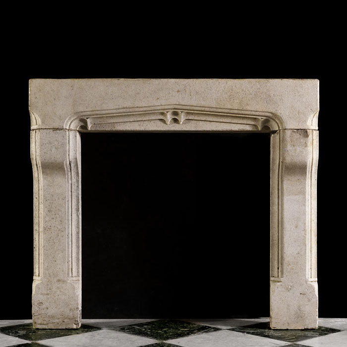 An Arts & Crafts Limestone Chimneypiece
