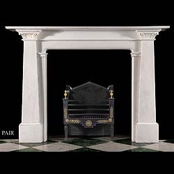 An Egyptian Revival Statuary Marble Fireplace