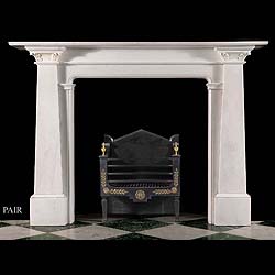 An Egyptian Revival Statuary Marble Fireplace