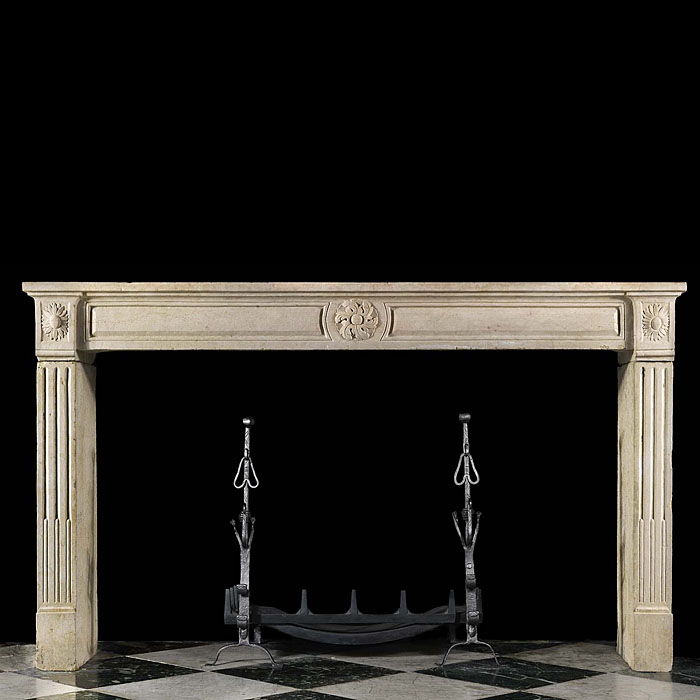 A Louis XVI Wide Limestone Chimneypiece
