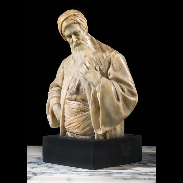 A finely carved antique alabaster sculpture 