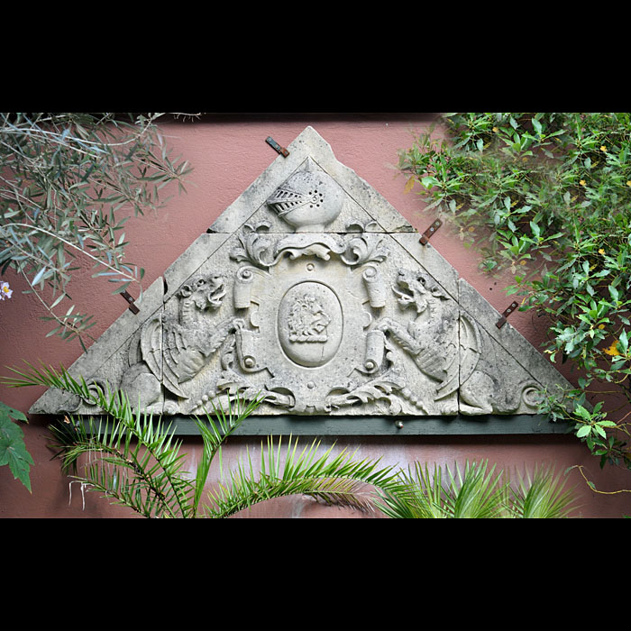 An Antique Bathstone Armorial Pediment