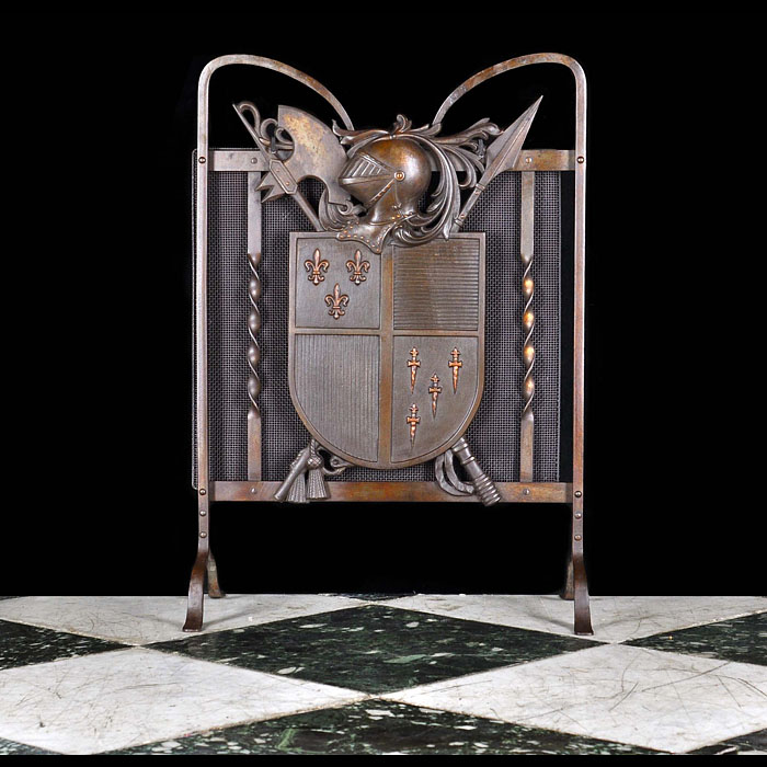 A Bronze & Cast Iron Armorial Fire Guard 