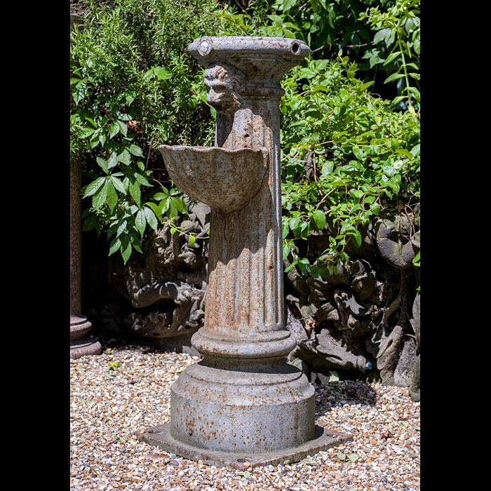 A Small Cast Iron Public Drinking Fountain