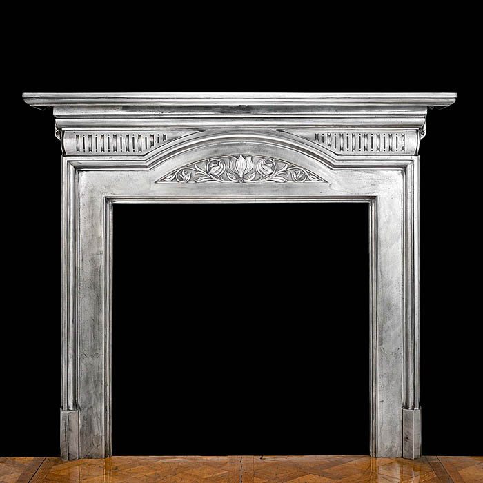 A cast iron Art Nouveau style antique chimneypiece