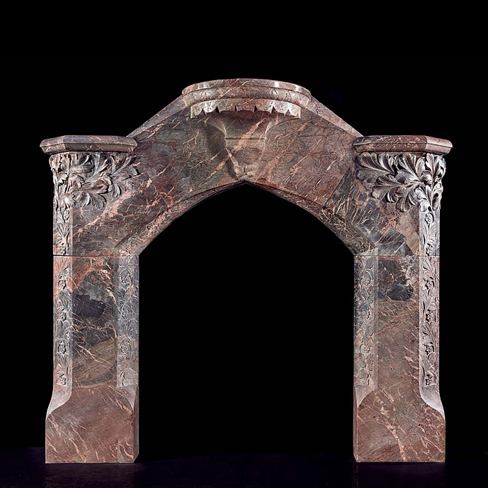 An Ashburton Marble antique Chimneypiece in the Reformed Gothic manner