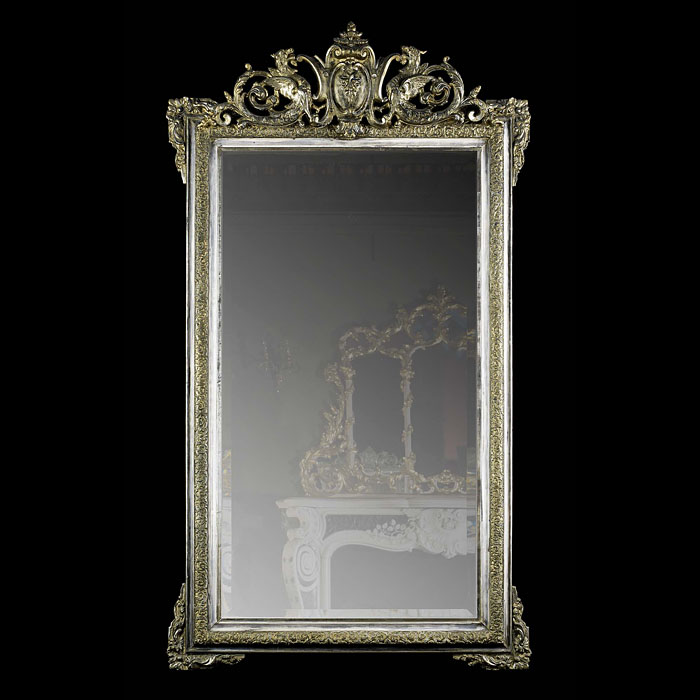 A Tall Silvered Louis XVI Wall Mirror