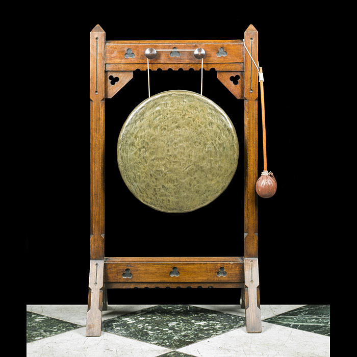 An Arts & Crafts Carved Oak Dinner Gong