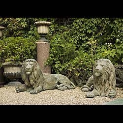 A Pair of Large Patinated Bronze Lions    