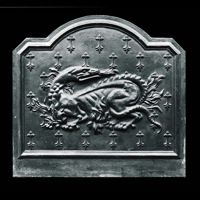 An Antique French cast iron salamander fireback 