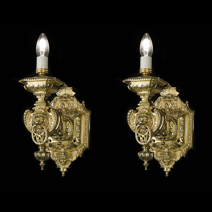  A pair of large Baroque style antique wall lights