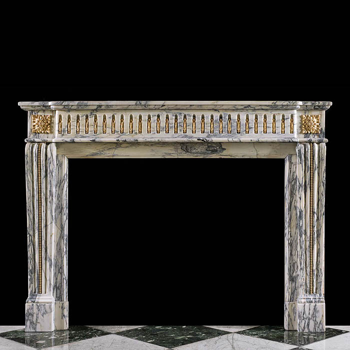 An antique Louis XVI style Arabescato marble chimneypiece.