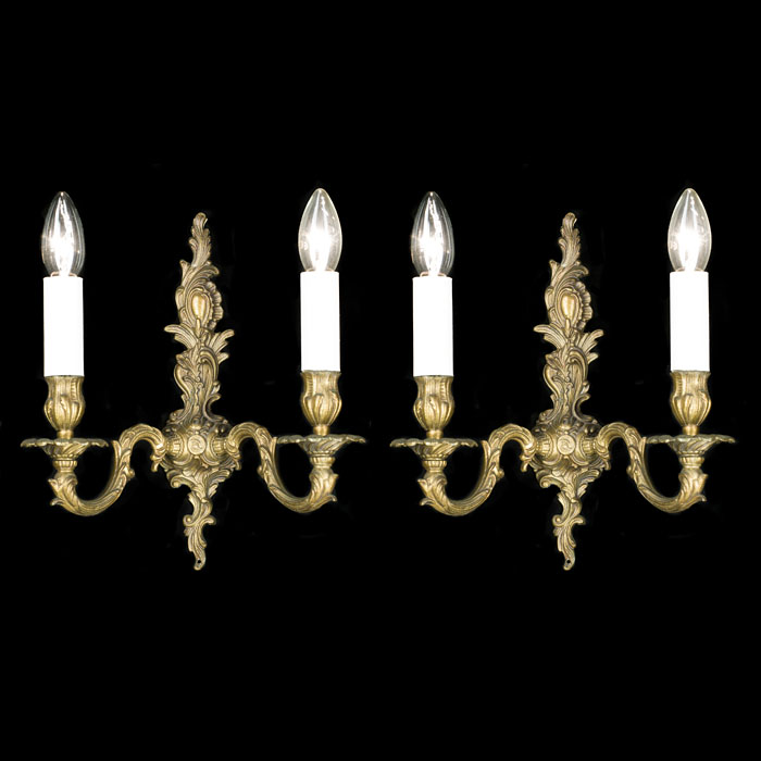 A pair of French brass 20th century wall lights    