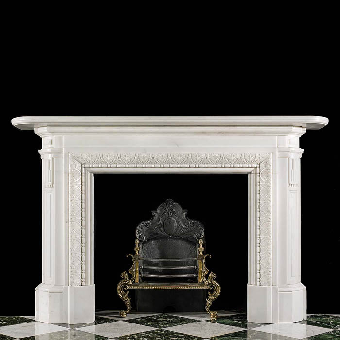 An Antique white statuary marble Regency style fireplace surround 