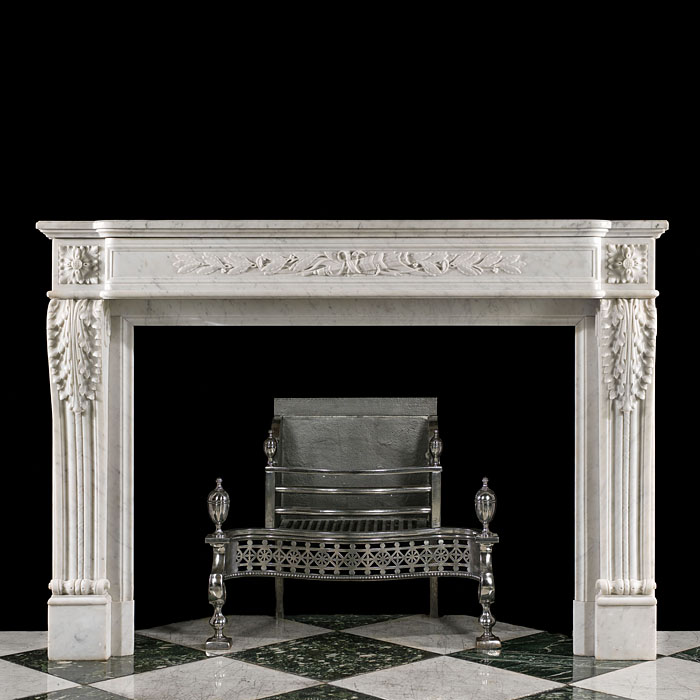 An antique Louis XVI style fireplace mantel