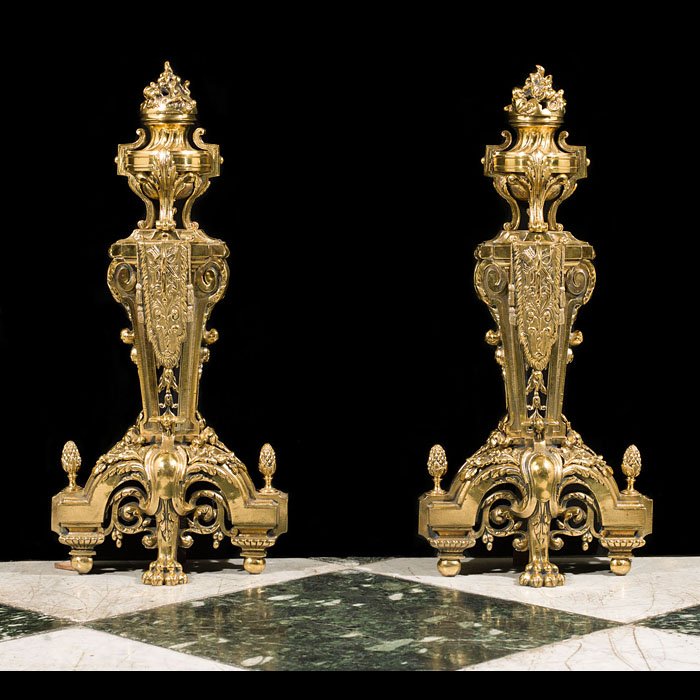  A pair of large brass Louis XVIstyle antique chenets.  