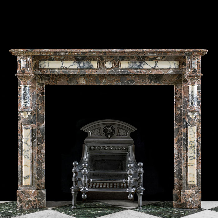 An antique Gothic Revival marble fireplace surround    