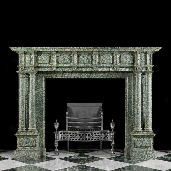 A substantial, columned antique chimneypiece in the Palladian style