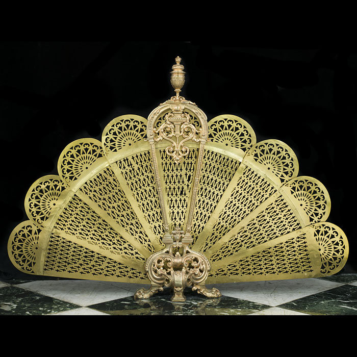  A cut brass Rococo style peacock fan fire guard   