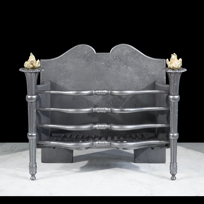 A small Regency style cast iron fire grate    