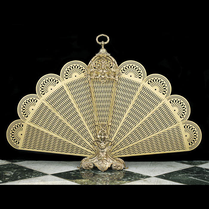 A 20th Century Cut Brass Peacock Fire Screen