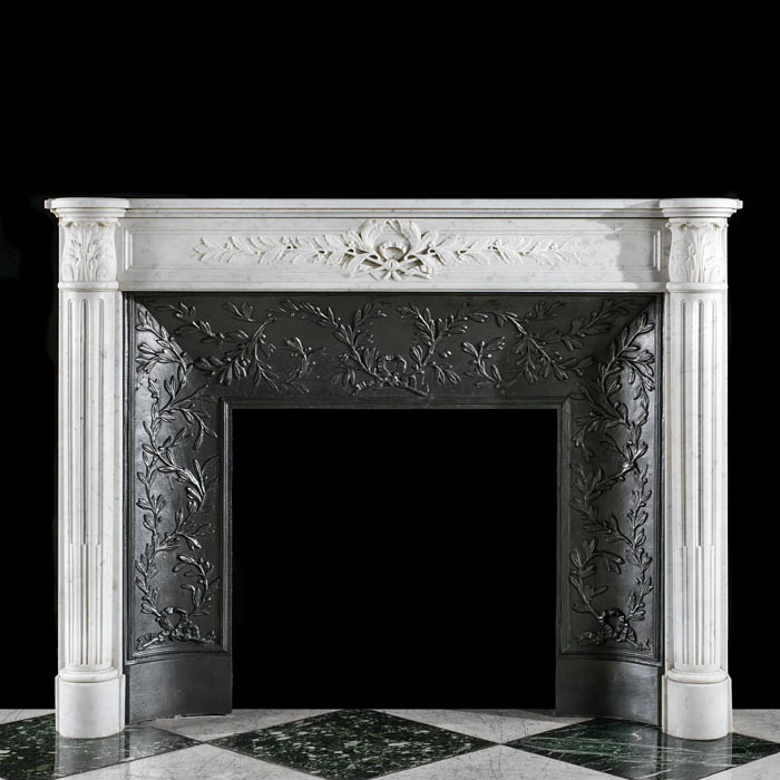 A Louis XVI style Carrara Fireplace