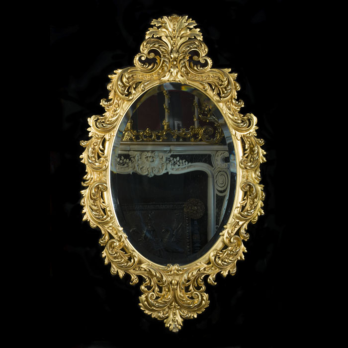 An Ornate Rococo Style Giltwood Wall Mirror