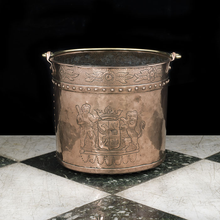 A small etched copper humorous log bin