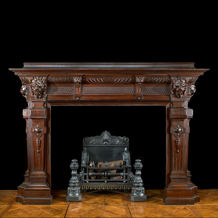 A huge Baroque style oak chimneypiece