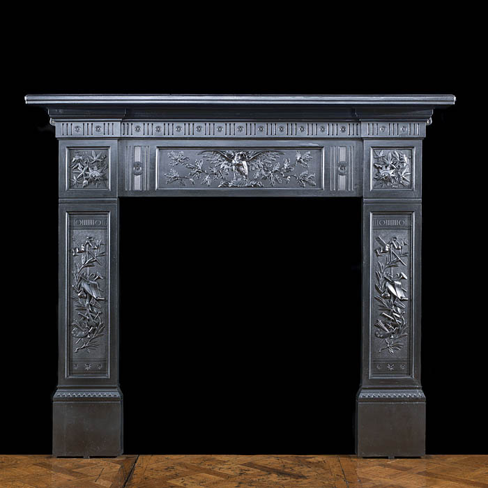 A cast iron Victorian eagle fire surround 