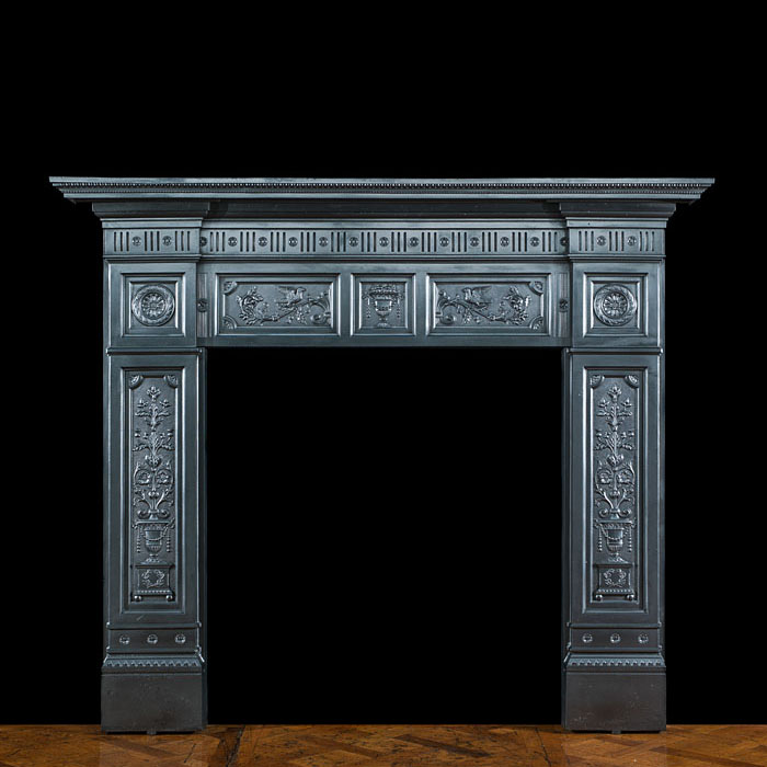 A Victorian cast iron fireplace surround 