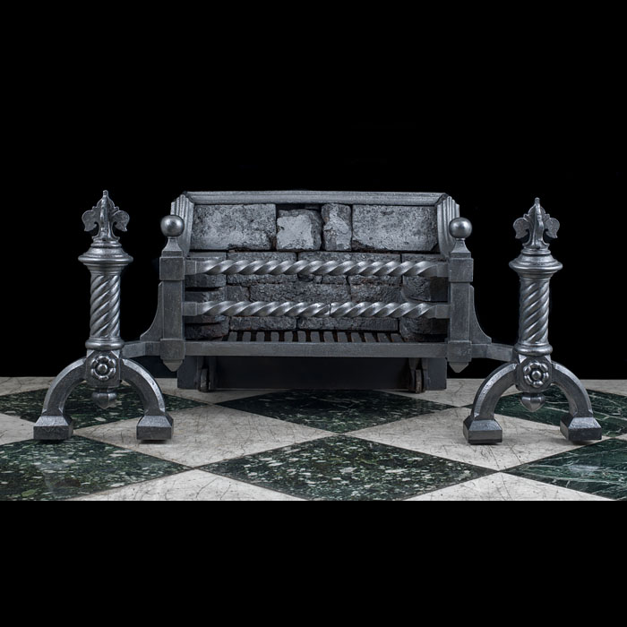 A large cast iron Gothic Revival fire grate