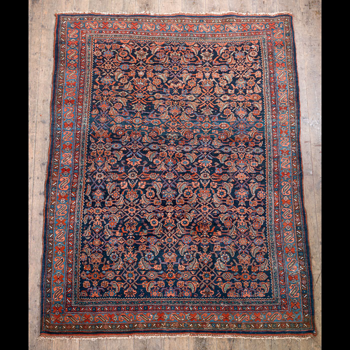 A Bidjar carpet dominated by floral motifs