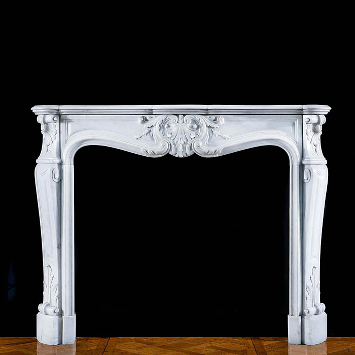 A Louis XV Carrara Marble fire surround