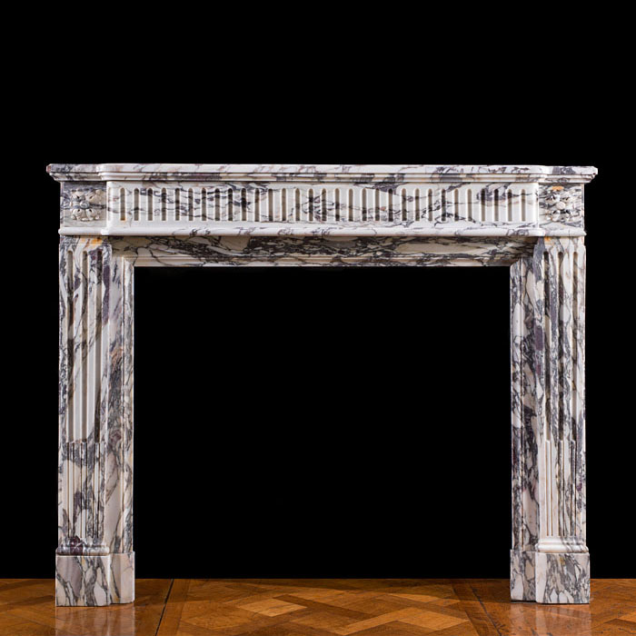 A fine French Breche Violette chimneypiece