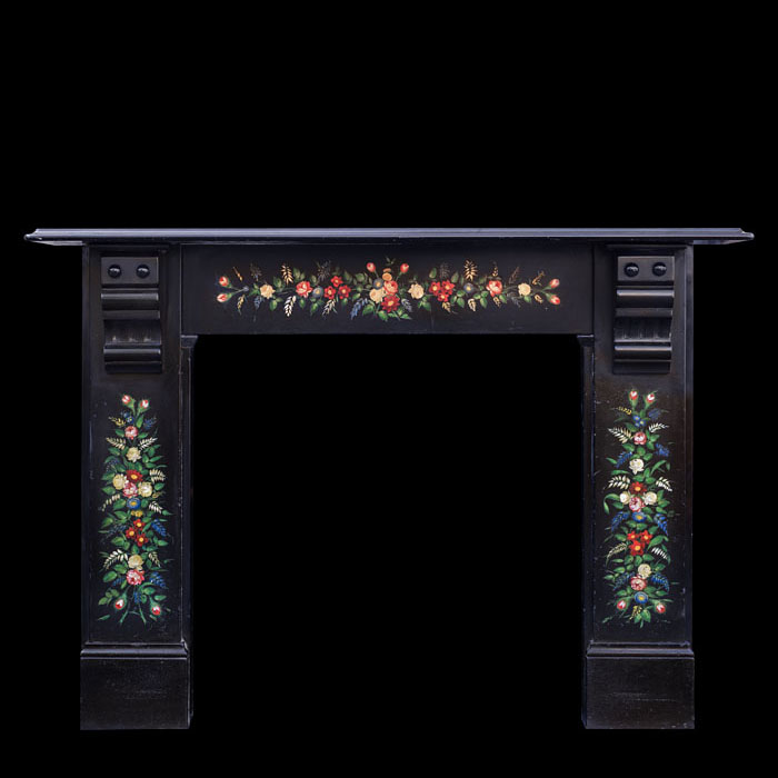 A black slate Victorian painted fireplace