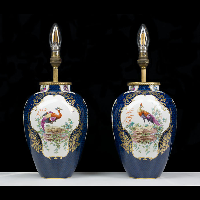 A hand painted pair of Booth's table lamps
