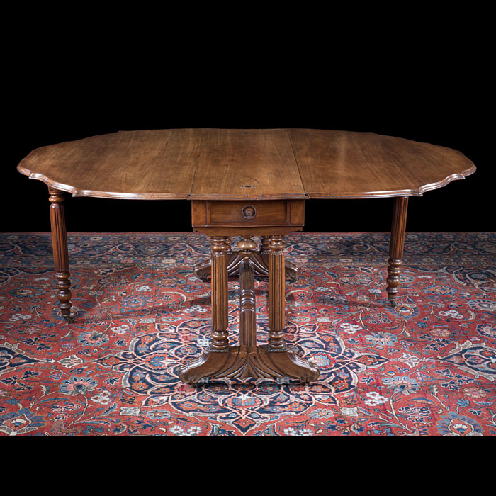 An Irish Mahogany Drop Leaf Gate Leg Dining Table