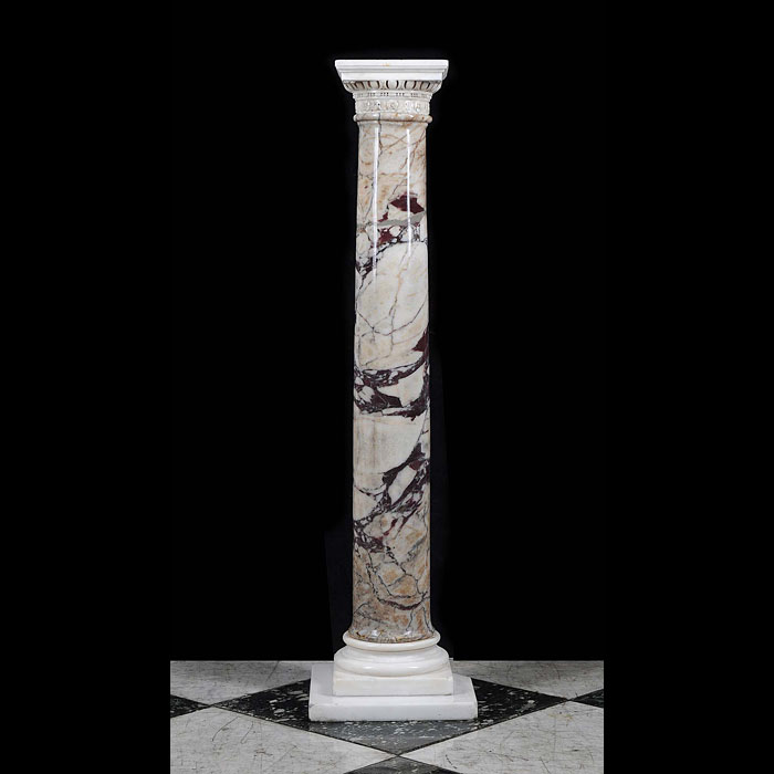 A Fleur-de-Peche marble pedestal column    