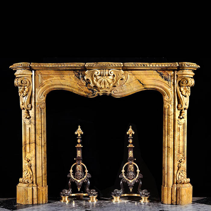 A fine antique Baroque fireplace in beautifully figured Siena  Marble    