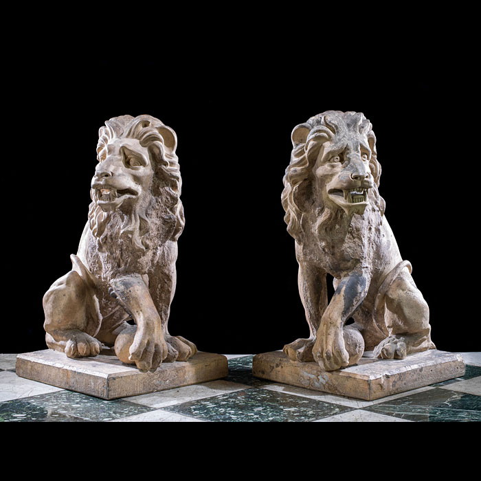  A pair of antique Baroque style terracotta lions
