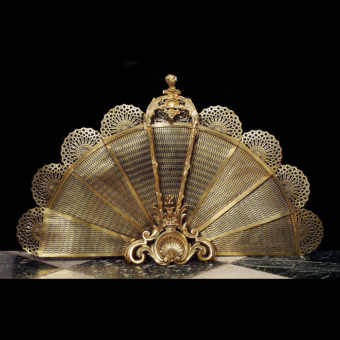  A brass peacock fan fire guard   